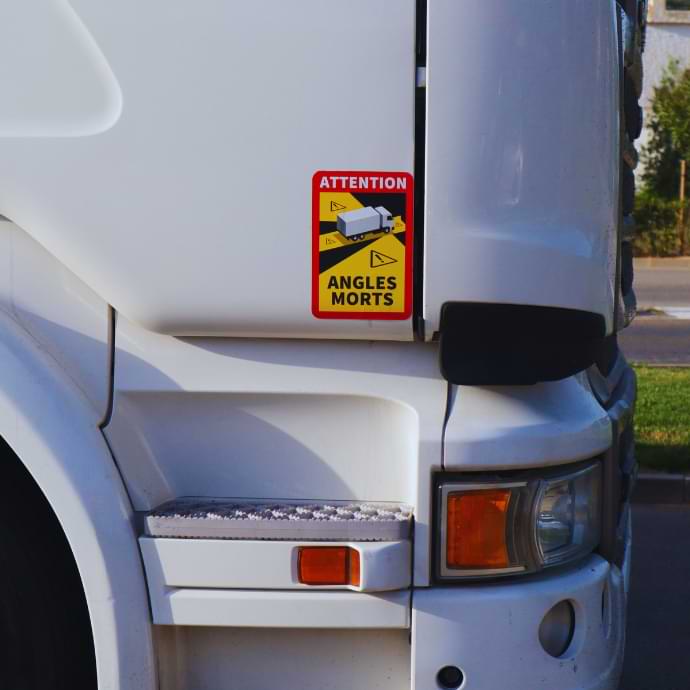 Lorry with safety warning stickers