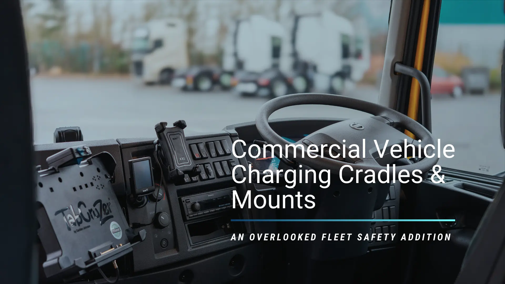 Commercial vehicle dashboard showing professionally installed charging cradles and mounts for mobile devices