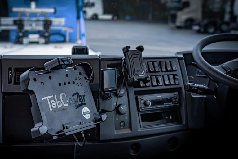 Tablet charging cradle and fleet device mounts installed on a commercial vehicle dashboard