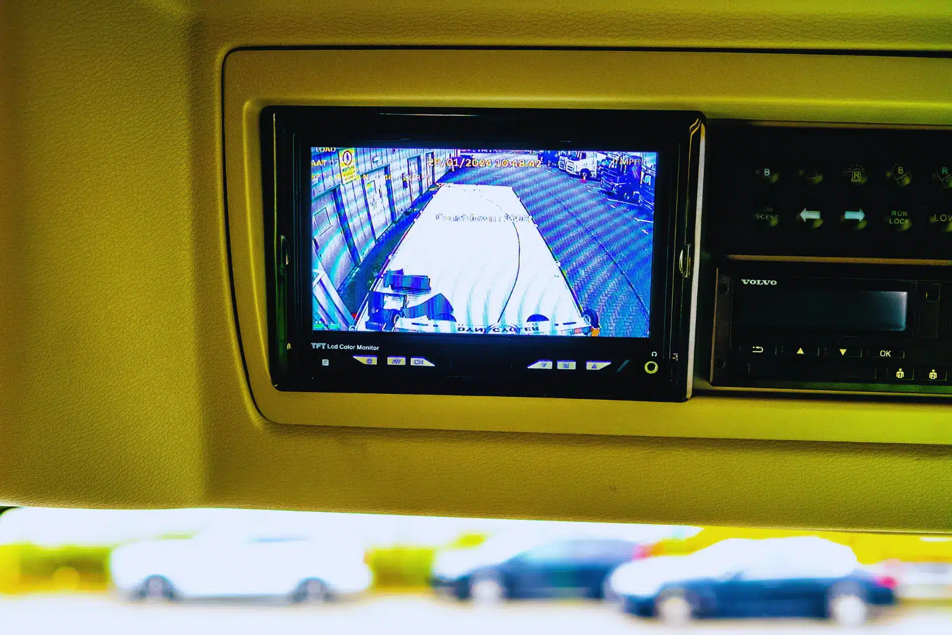 In-cab monitor showing rear view from onboard camera system.