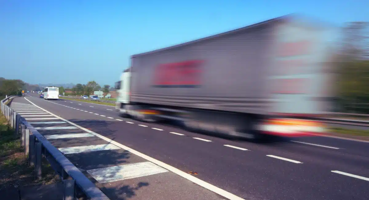 Lorry with visual elements representing compliance, safety, and brake system monitoring